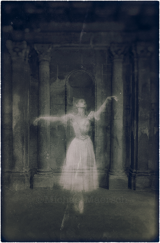 A ghostly dancer performs inside the ruins of an English manor hall